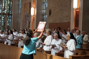 sisters reading in chapel service