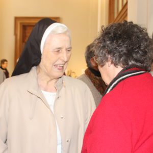 Sister M. Alberta Lawless visits with a fellow sister.