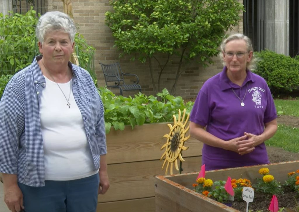 Sister Suzanne and SIster Barbara Ann in the vegetable gardens at Sacred Heart Convent.