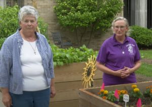 Sister Suzanne and SIster Barbara Ann in the vegetable gardens at Sacred Heart Convent.
