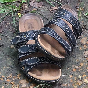 a pair of sandals lying on the ground